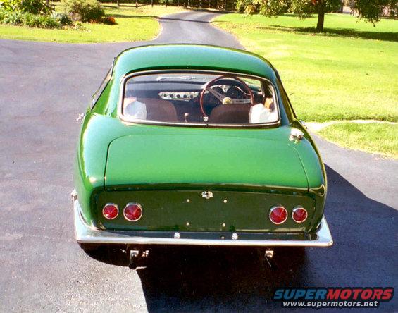 Green 1960 Lotus Elite coupe, rear view, chrome bumper, dual taillights