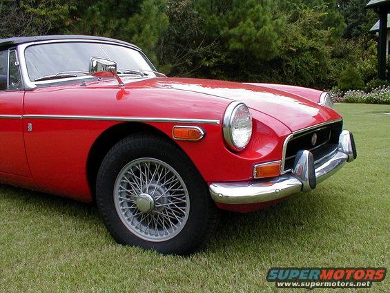 1970 MG B convertible sports car, front quarter view, red paint, wire wheels