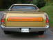 1972 Ford Ranchero - Rear view of a 1972 Ford Ranchero, showing its distinctive tailgate stripe and chrome bumper.