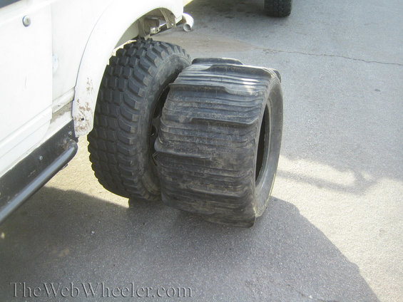 1987 Suzuki Samurai side view showing paddle tires mounted on rear wheel