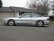 1994 Ford Probe - This silver 1994 Ford Probe GT is parked on a residential street.