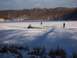 1971 Porsche 914 - A frozen lake scene with some debris in the ice and two figures in the distance.