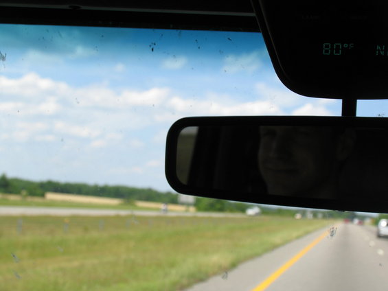 Interior view from windshield showing a digital temperature display of 80 degrees