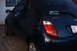 2002 Ford Coupe - Rear view of a dark blue Ford Ka parked in front of a building.