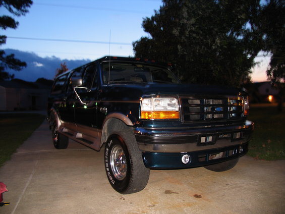 1995 Ford C-350 Centurion Conversions SUV, dark green, 3q-front view