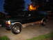 1995 Ford C-350 (Centurion Conversions) - This 1995 Ford C-350 Centurion conversion SUV is seen in a driveway at dusk.