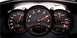 1996 Ford Probe - Dashboard gauges display speed, RPM, fuel level, and temperature. Digital readout shows 243 km.