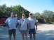 1996 Ford Bronco - Three men pose for a photo outdoors with two SUVs visible in the background.