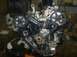1996 Ford Probe - A complex engine assembly is shown, with various belts and pulleys prominently displayed.