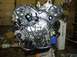 1996 Ford Probe - Engine assembly with timing belts and pulleys. Box in background indicates it is for a Probe 2.5L V6.