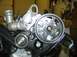 1996 Ford Probe - This image shows a close-up view of an engine's timing belt and pulley system, likely during a repair or maintenance procedure.