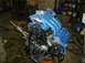 1996 Ford Probe - Engine assembly with blue intake manifold and exhaust components visible.