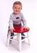 2002 Ford Taurus - A young child wearing a 'Birthday Boy' shirt smiles while sitting on a red stool.