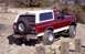 1993 Ford Bronco - This 1993 Ford Bronco is shown off-roading on a rocky terrain.