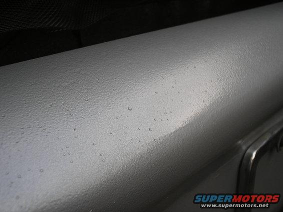 close up finish of bumper showing the texture of the hammered silver paint