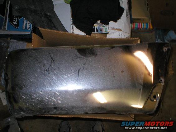 Chrome bumper part with scuffs and scratches