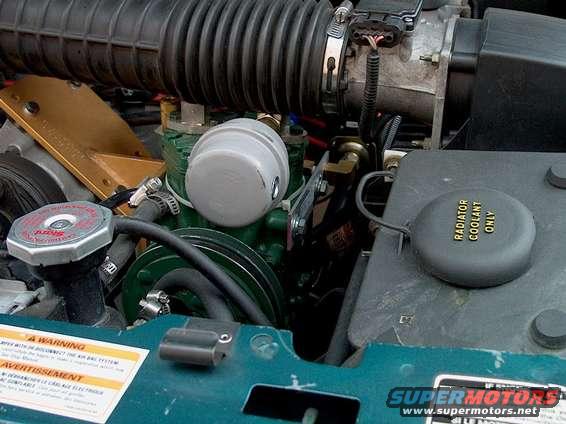 im000010.jpg Front view of air filter.  Air manifold bracket on drivers side of York.