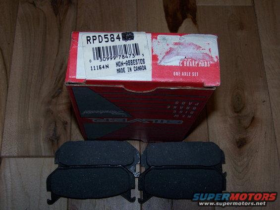 Box of RPD584 brake pads, made in Canada, with four new pads laid out in front