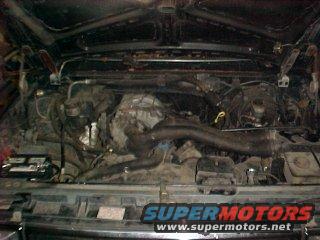 90-eng_cmpt_sm.jpg Engine compartment of the donor '90