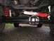 1979 Ford Bronco - Undercarriage view shows red coil springs and a Skyjacker Hydro steering stabilizer, suggesting aftermarket modifications.