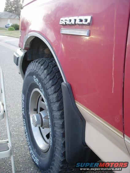 1990 Ford Bronco side view showing fender, wheel, and 'BRONCO' badge