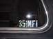 1979 Ford Bronco - A silver decal with the text 351MFI is visible on the window of a vehicle.