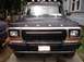 1979 Ford Bronco - This 1979 Ford Bronco features a prominent grille guard and auxiliary lights mounted on the roof rack.