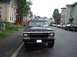 1979 Ford Bronco - This 1979 Ford Bronco is parked on a street lined with houses and other vehicles.