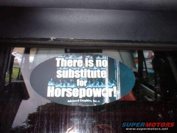 Interior view of a vehicle with a "There is no substitute for Horsepower!" sticker