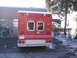 1984 Ford F-350 - Rear view of a red ambulance with service number 297 and a license plate reading 835-USN.