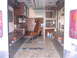 1984 Ford F-350 - The interior of this vehicle shows benches, cabinets, and a driver's seat, but no clear year identification.