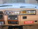 1984 Ford F-350 - Interior view of a vehicle dashboard with numerous auxiliary switches and gauges.