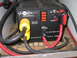 1984 Ford F-350 - This Tripp Lite power inverter is connected to thick red and black cables, with yellow AC output connectors.