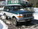 1994 Ford Bronco - This 1994 Ford Bronco features a two-tone green and white paint scheme and is seen here in a snowy environment.