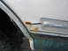 1994 Ford Bronco - Rust is visible on the fender of this 1994 Ford Bronco, near the wheel well and trim.