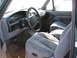 1994 Ford Bronco - Interior view of a 1992 Ford Bronco XLT, showing the dashboard, steering wheel, and front seats.