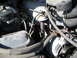 1994 Ford Bronco - Close-up view of the engine bay of a 1994 Ford Bronco, showing mechanical components and wiring.