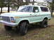 1979 Ford Bronco - This light green Ford Bronco features a lifted suspension and off-road tires.