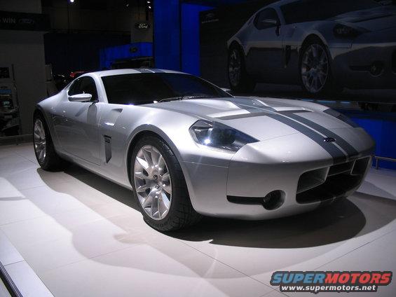Silver Ford Shelby GR-1 concept car with dual racing stripes on display