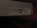1994 Ford Bronco - A part with a Ford logo and a sticker that reads 'WARRANTY ITEM DO NOT OPEN'.
