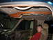 1995 Ford C-350 (Centurion Conversions) - Interior view of a vehicle's overhead console wood trim and visible wiring.