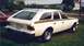 1973 Ford Ranchero - This 1973 AMC Hornet Sportabout station wagon is seen from the rear quarter angle. The vehicle is white with a gold stripe along the side.