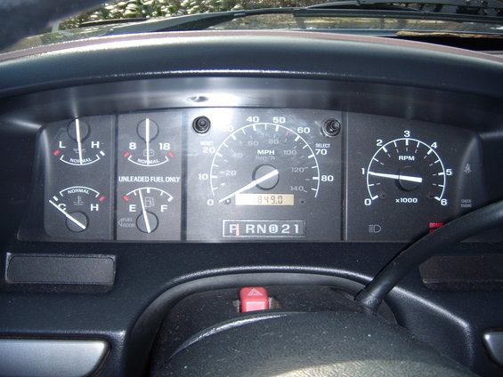 1992 Ford Bronco dashboard with speedometer, tachometer, fuel, and temperature gauges
