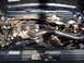 1992 Ford Bronco - Engine bay details, including hoses and the MSD sticker on the radiator support.