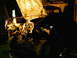 2001 Dodge 2500 - The engine bay of a truck is visible with the hood open, illuminated in a dimly lit garage.