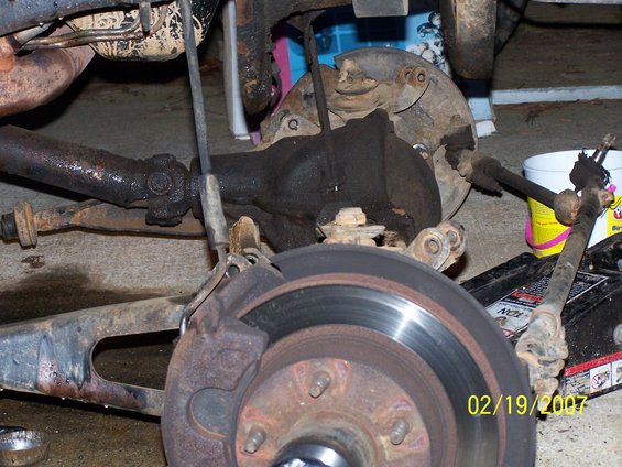 Rear axle and suspension parts with a date stamp of 02/19/2007