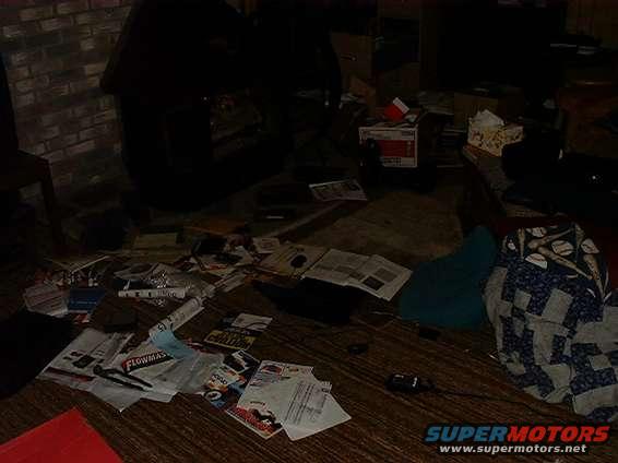 research.jpg Here is my research station with my Laptop, books, and articals filed with libray...  Okay its my messy basment den!