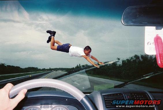 Man flying out of windshield, interior view