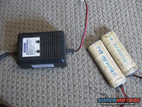Tower Power AC/DC quick charger with two batteries labeled "#1 3400mAh" and "#2 3400mAh"