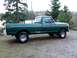 1977 Ford F-150 - A green 1977 Ford F-150 pickup truck is shown from the side, parked outdoors.